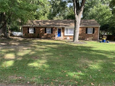 Ranch-style home with a front lawn | Image 2