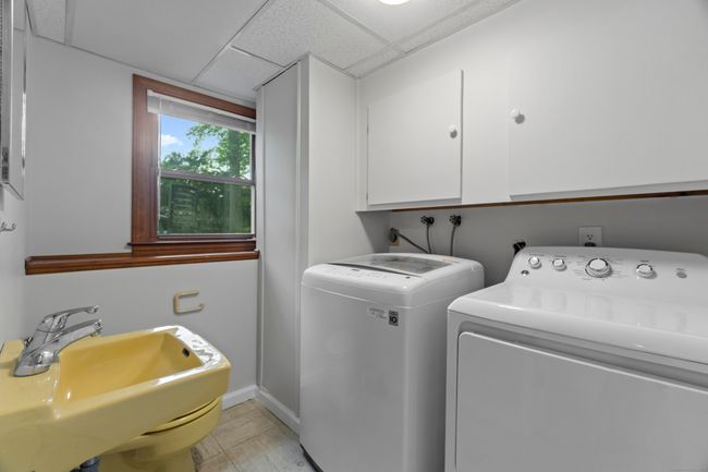 Half bath and laundry in the lower level | Image 23
