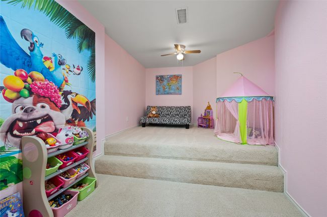 Playroom with carpet flooring and ceiling fan | Image 36
