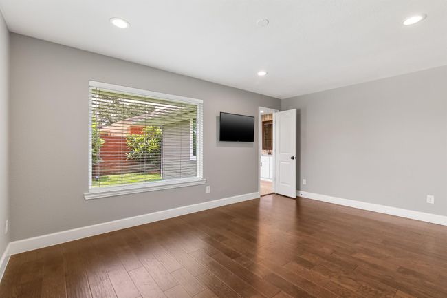 Another view of the primary bedroom with en suite. | Image 17