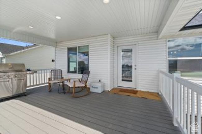 Wooden deck featuring area for grilling | Image 33