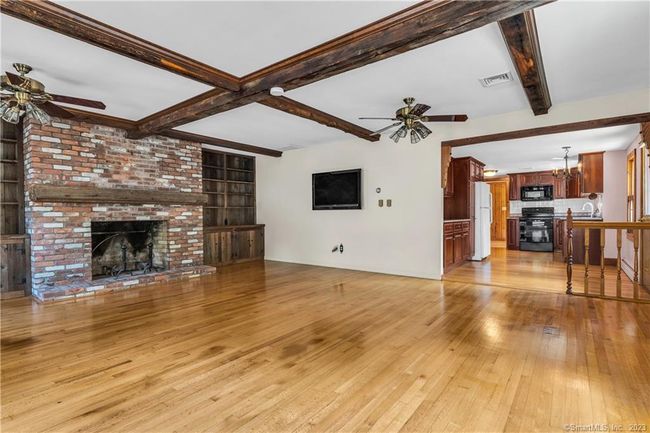Designed with space for both casual seating and dining this room is light, bright and inviting. | Image 6