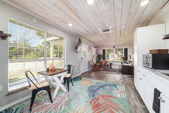 Open concept kitchen area and living room area | Image 4