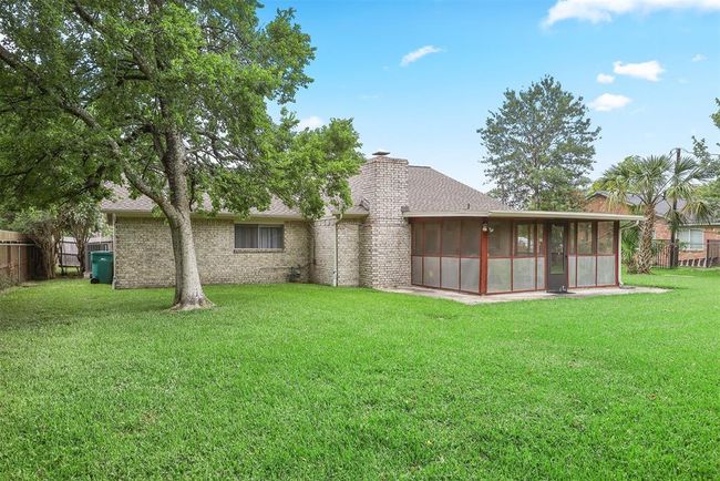 Huge Backyard with Lush Green Grass | Image 16