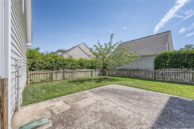 Fenced backyard featuring a patio area | Image 36