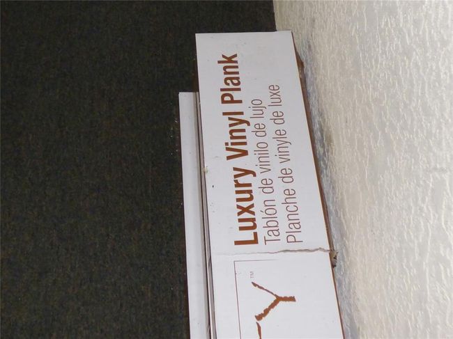 four spare luxury vinyl plank which has been installed in the 3 bedrooms | Image 61