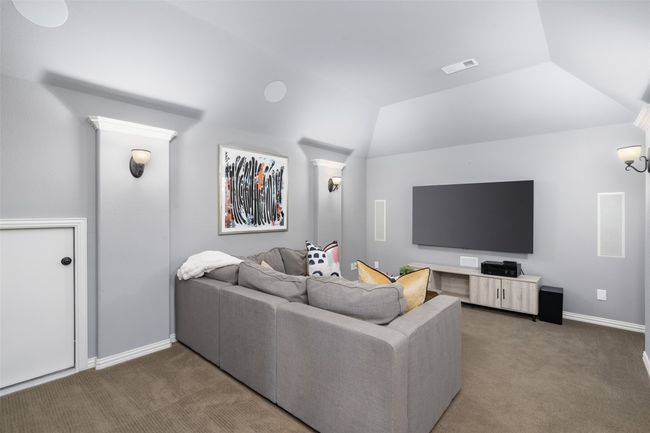 Theater room boasts upgraded carpet, sound, uplighting and taller ceilings. Pass the popcorn please. | Image 27