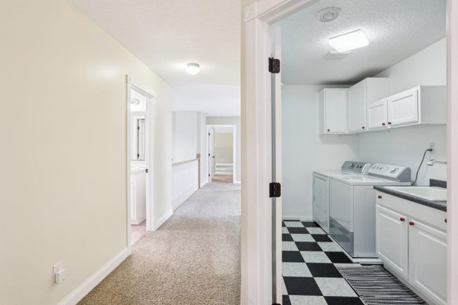 Upper laundry is stategically placed between 3 kids rooms! | Image 28