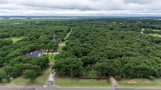 Aerial view of surrounding wooded area | Image 34