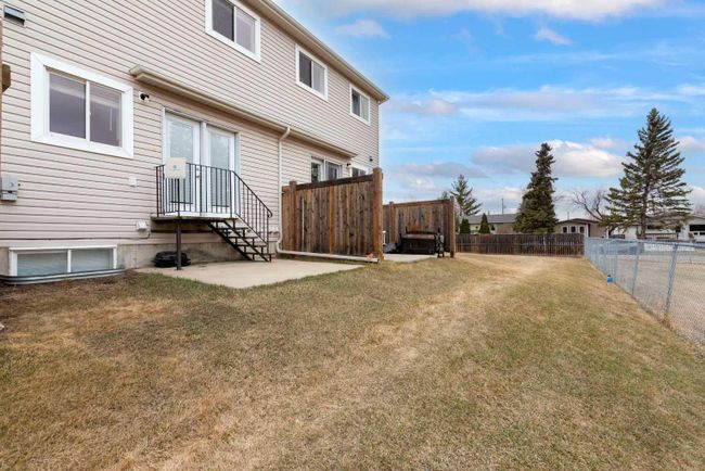 312 - 4811 47 Avenue, Home with 4 bedrooms, 2 bathrooms and 2 parking in Lloydminster SK | Image 34
