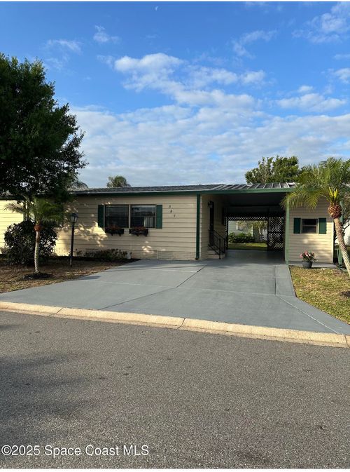 327 Macadamia Dr, Barefoot Bay, FL, 32976-6825 | Card Image