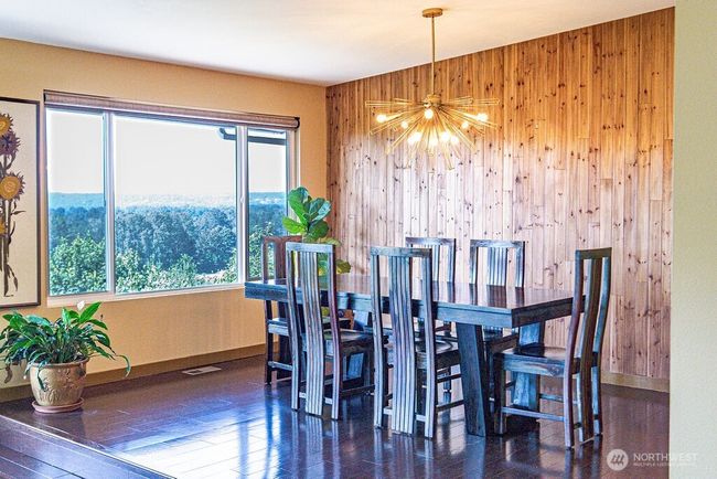 Dining room opens to the living area. | Image 8