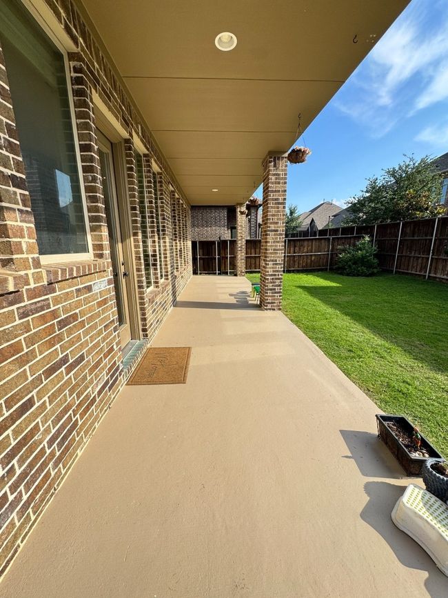 Fenced backyard featuring a patio | Image 27