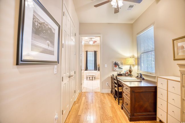 There is an area in between the bedroom and bathroom you can use as an office, hobby room, relaxing area, or even a small workout area. | Image 21