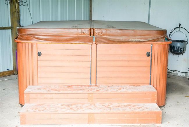 Exterior details featuring a hot tub and a sauna | Image 24