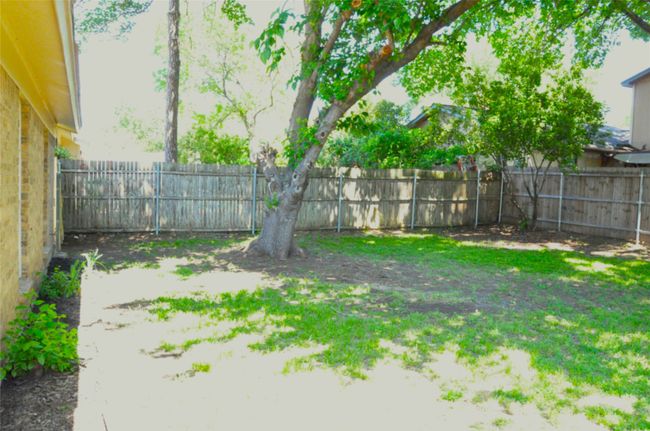 View of yard featuring a fenced backyard | Image 28