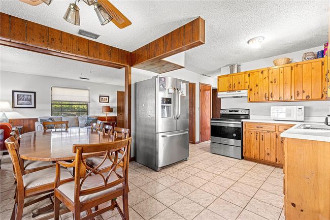 15950 Ne 50 Th St, Home with 4 bedrooms, 2 bathrooms and null parking in WILLISTON FL | Image 8