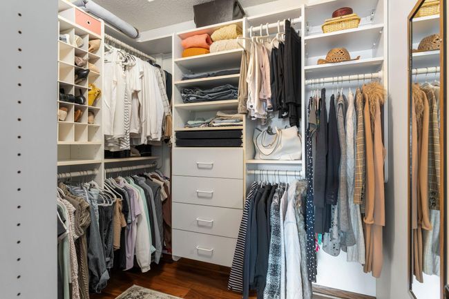 Owners suite walk in california systems custom closet | Image 22