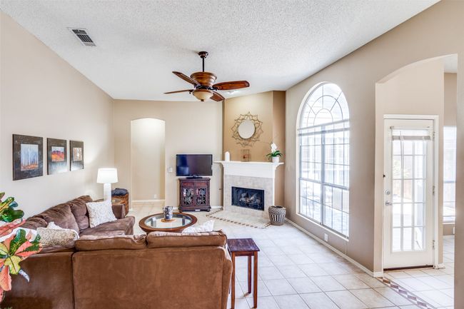 Traffic flows seamlessly from the living space into the kitchen and out to the courtyard. | Image 8