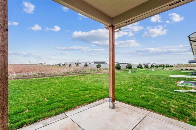 View of yard with a patio | Image 26