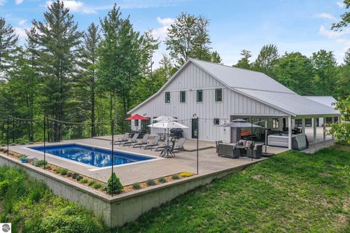 7683 Herendeene Trl, Lake Ann, MI, 49650-9728 | Card Image
