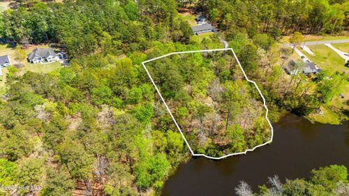 176 Country Club Dr W, Minnesott Beach, NC, 28510-9400 | Card Image