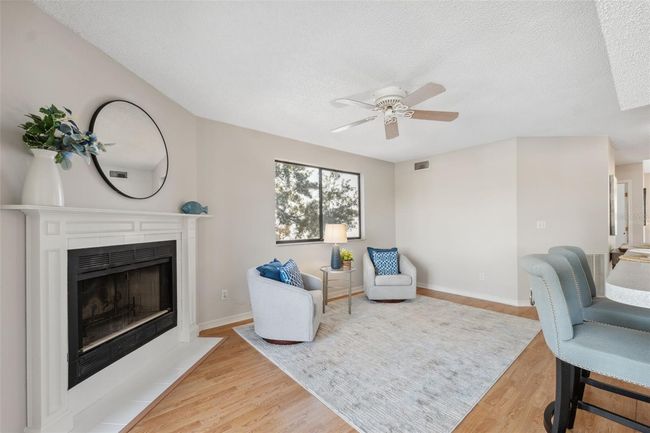fireplace in den off of kitchen second floor | Image 26