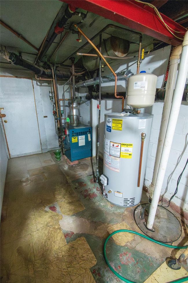 Utilities with gas water heater and a heating unit | Image 23