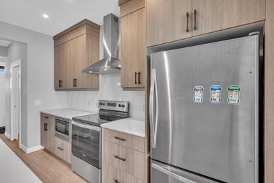 77 Herron Mews Ne, Home with 4 bedrooms, 3 bathrooms and 2 parking in Calgary AB | Image 3