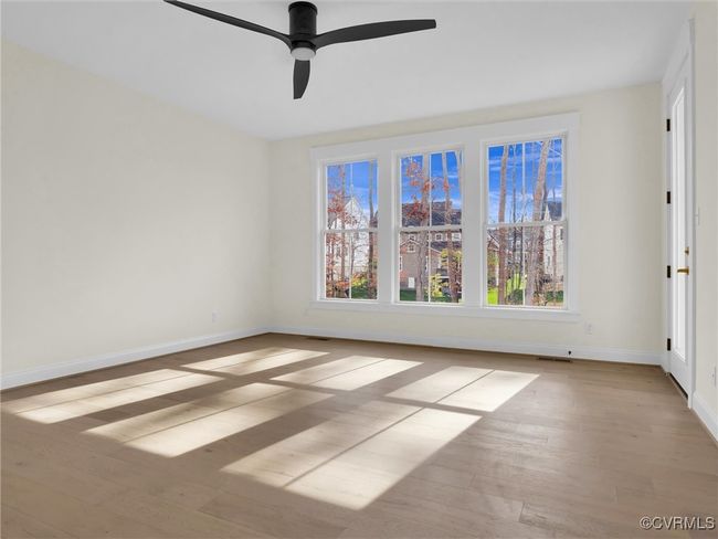 Photo represents the plan, not the actual home. Design selections may vary. The primary suite with walk-in closet and ensuite bath with walk-in shower and double vanity. | Image 11