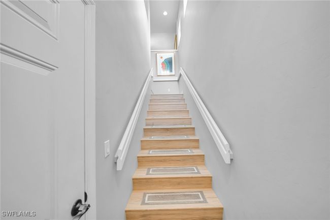 Staircase with garage door | Image 19