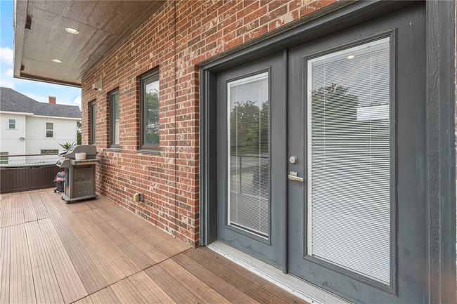 Wooden terrace featuring area for grilling | Image 12