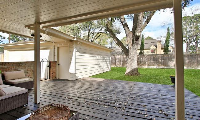 Covered patio and large deck. | Image 45