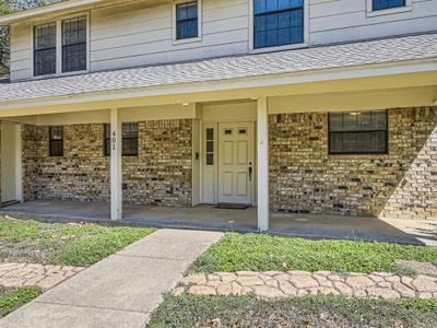 Doorway to property featuring covered porch | Image 3