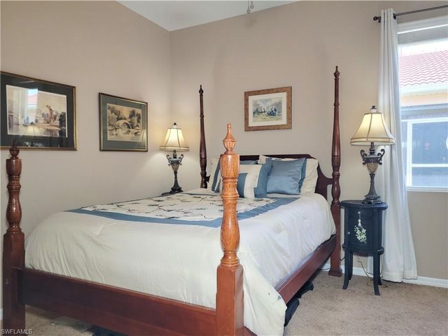 Bedroom with carpet floors and baseboards | Image 21
