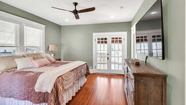 View into sunroom from primary bedroom | Image 7