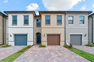 8663 Escue Street, Townhouse with 3 bedrooms, 2 bathrooms and null parking in Lake Worth FL | Image 1