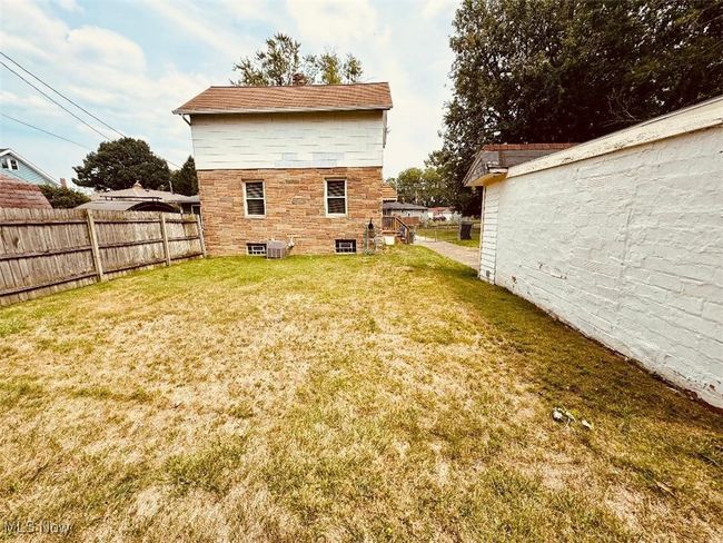 Rear of home spacious yard | Image 16