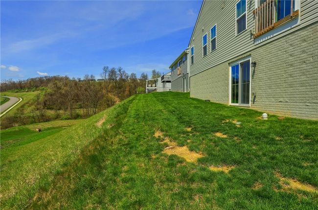 Walk out lower level will be perfect for future basement/patio area. | Image 6