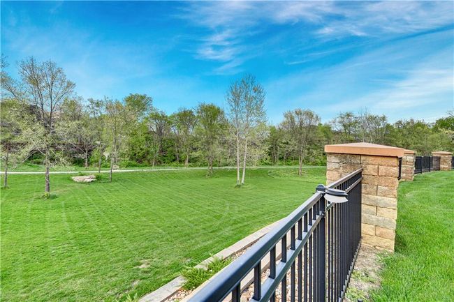 View of yard with a balcony | Image 61