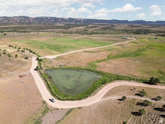 Bird's eye view of a water and mountain view | Image 16