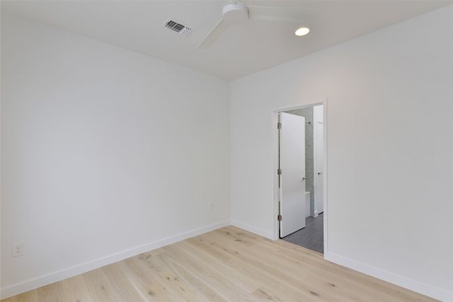 Empty room featuring recessed lighting, visible vents, baseboards, and wood finished floors | Image 21