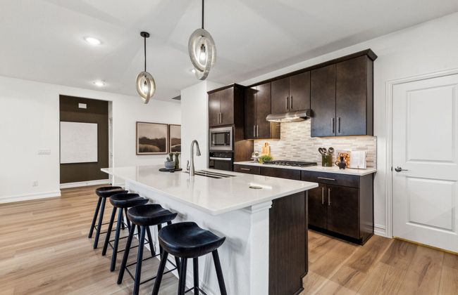 Spacious kitchen with ample cabinet space *Photos of furnished model. Not actual home. Representative of floor plan. Some options and features may vary | Image 7