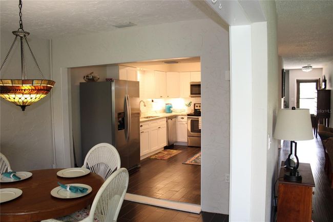 Dining room looking towards kitchen. | Image 13