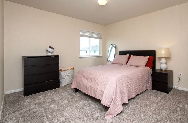 Bedroom featuring carpet flooring and baseboards | Image 21