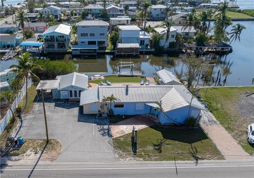 4673 Pine Island Rd Nw, MATLACHA, FL, 33993-9784 | Card Image