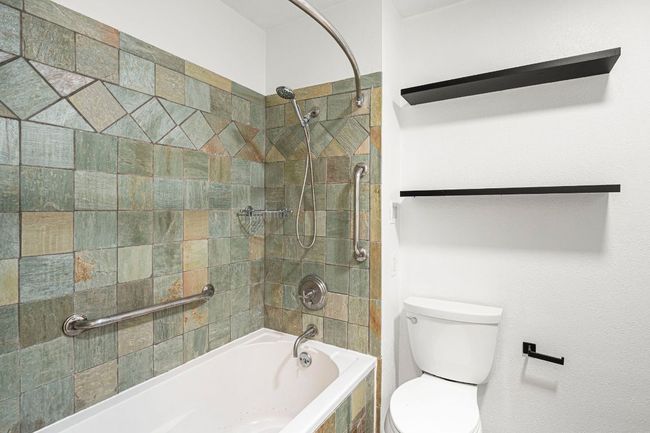 Bathroom with shower / bathtub combination and toilet | Image 24