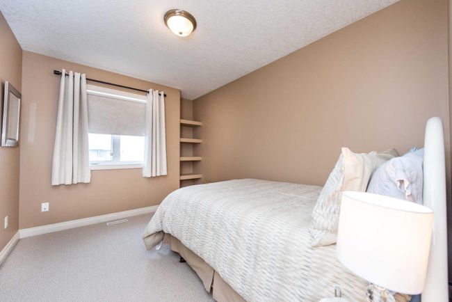 1212 Woodside Way Nw, Home with 4 bedrooms, 2 bathrooms and 4 parking in Airdrie AB | Image 36