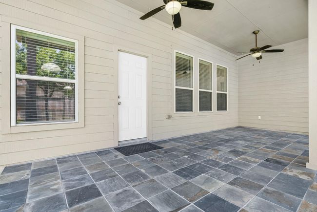 Back patio with lights and ceiling fans | Image 37