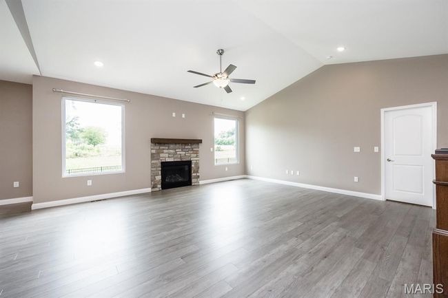 Stone fireplace with vaulted ceiling | Image 6
